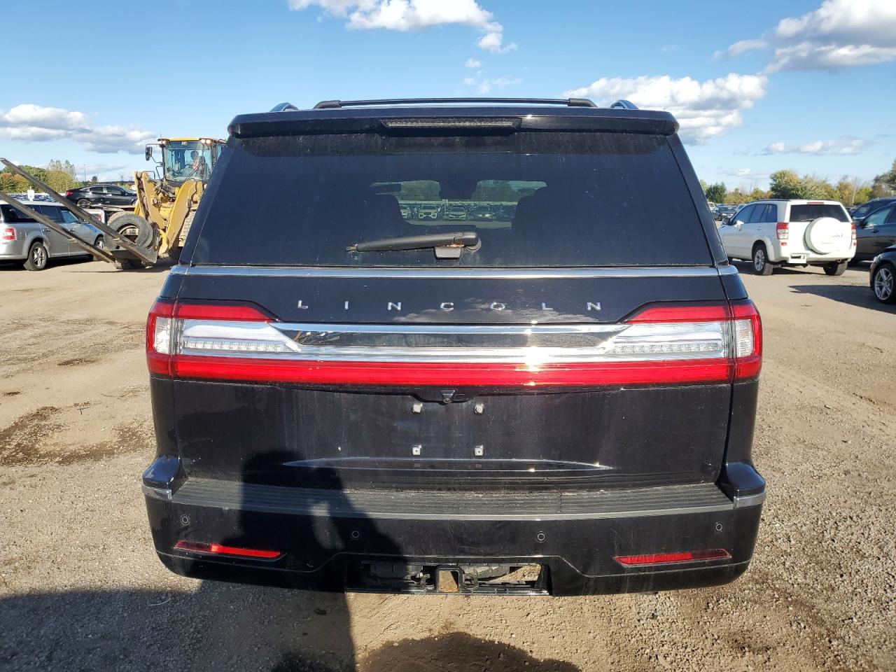 2021 Lincoln Navigator VIN 5LMJJ2LT0MEL08497 Copart auction photo, vandalism damage thumbnail 6