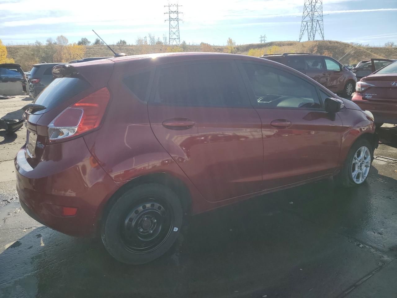 2016 Ford Fiesta VIN 3FADP4EJ9GM136565 Copart auction photo, front end / side damage thumbnail 3
