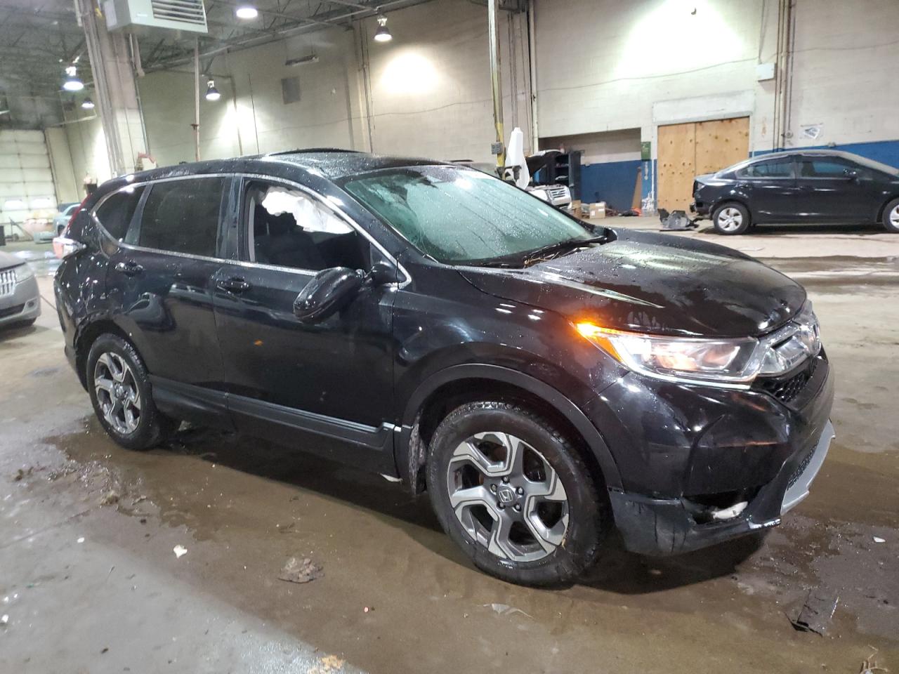 2019 Honda CR-V VIN 2HKRW2H58KH645275 Copart auction photo, rollover damage thumbnail 4