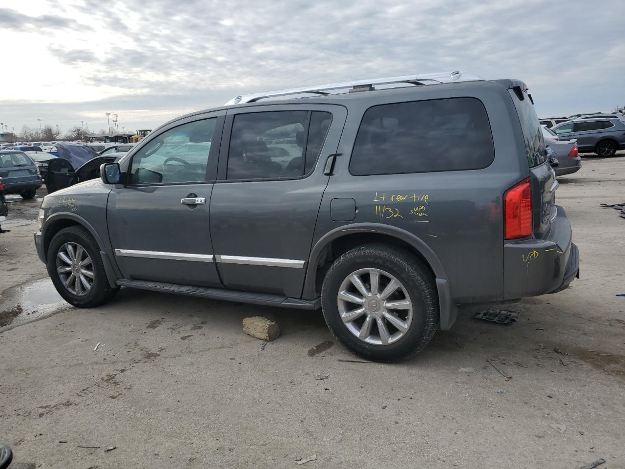 2010 Infiniti QX56 VIN 5N3ZA0NE2AN909809 Copart auction photo, side / rear end damage thumbnail 2