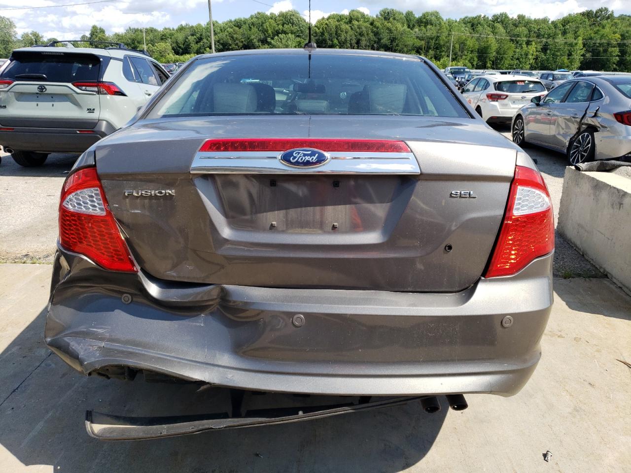 2012 Ford Fusion VIN 3FAHP0JA5CR207399 Copart auction photo, rear end damage thumbnail 6