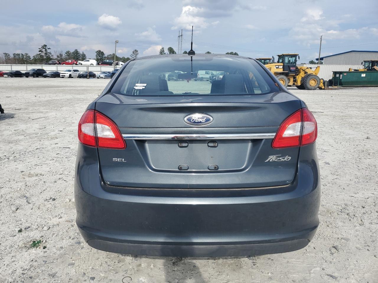 2011 Ford Fiesta VIN 3FADP4CJXBM232524 Copart auction photo, front end / side damage thumbnail 6