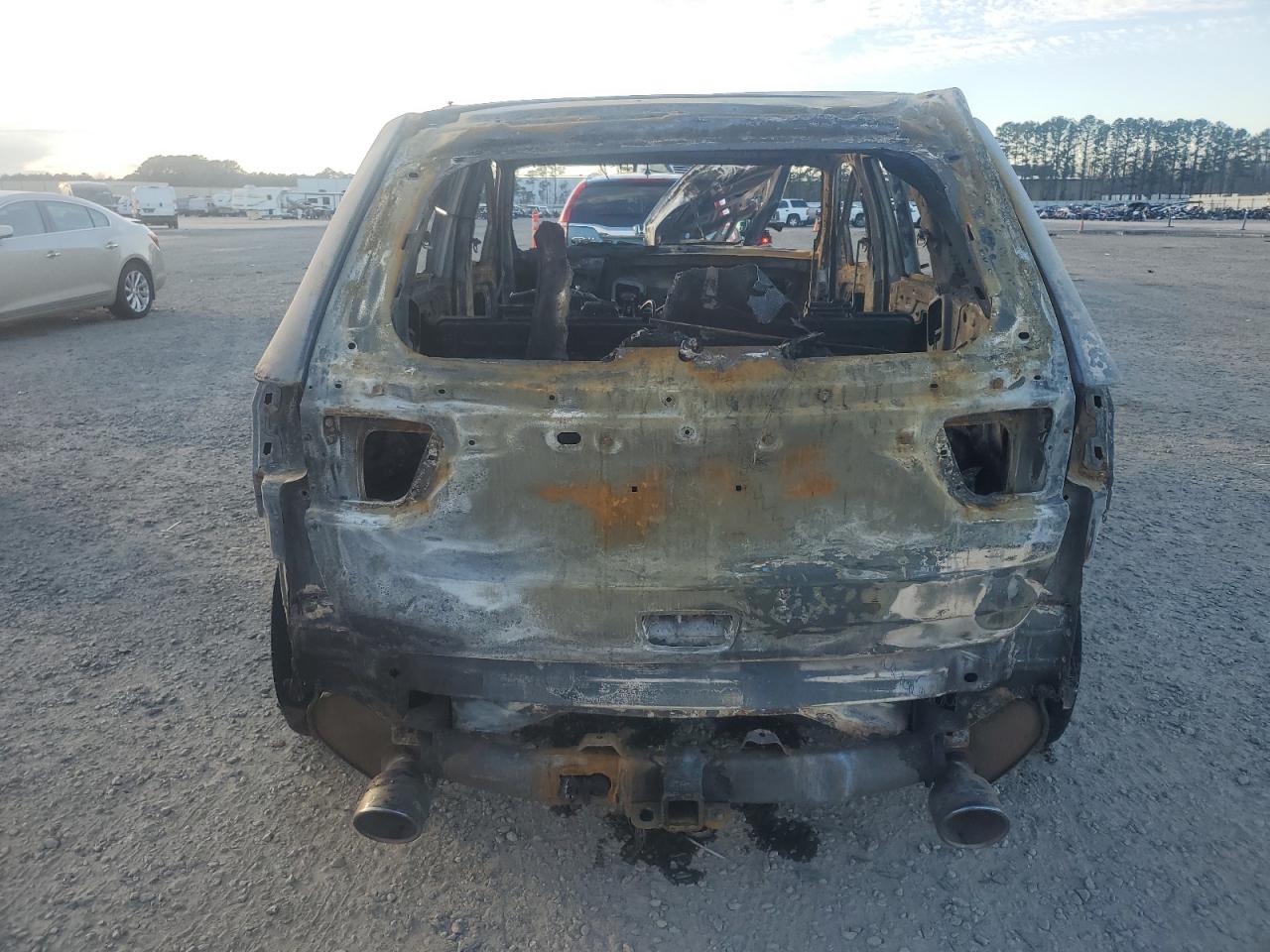2014 Jeep Grand Cherokee VIN 1C4RJFDJ8EC290018 Copart auction photo, burn damage thumbnail 6