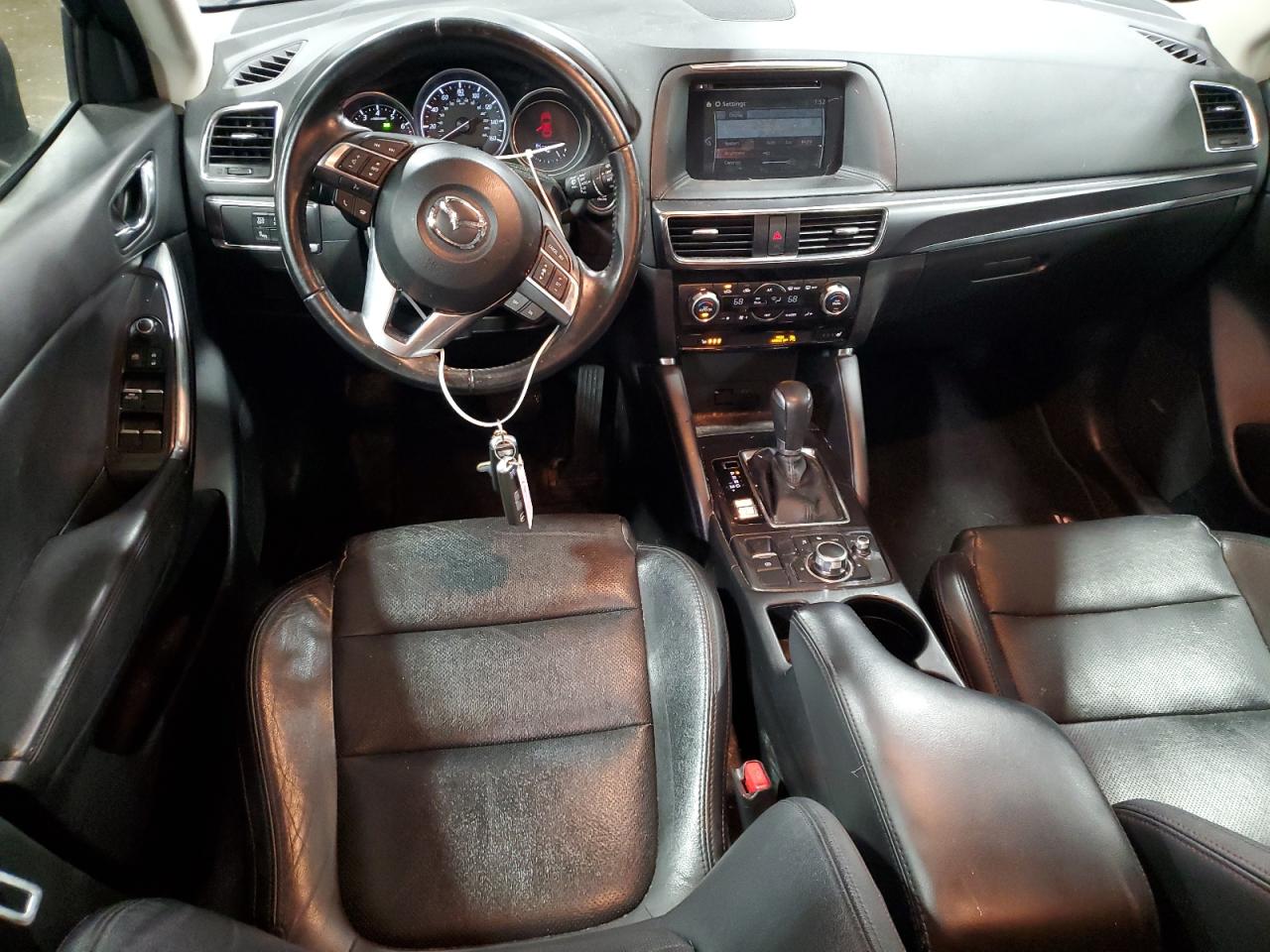 2016 Mazda CX-5 VIN JM3KE4DYXG0822209 Copart auction photo, side damage thumbnail 8