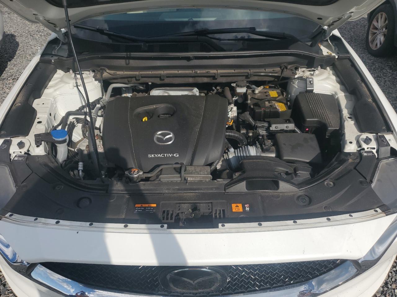 2021 Mazda CX-5 VIN JM3KFACM9M0304873 Copart auction photo, water/flood damage thumbnail 12