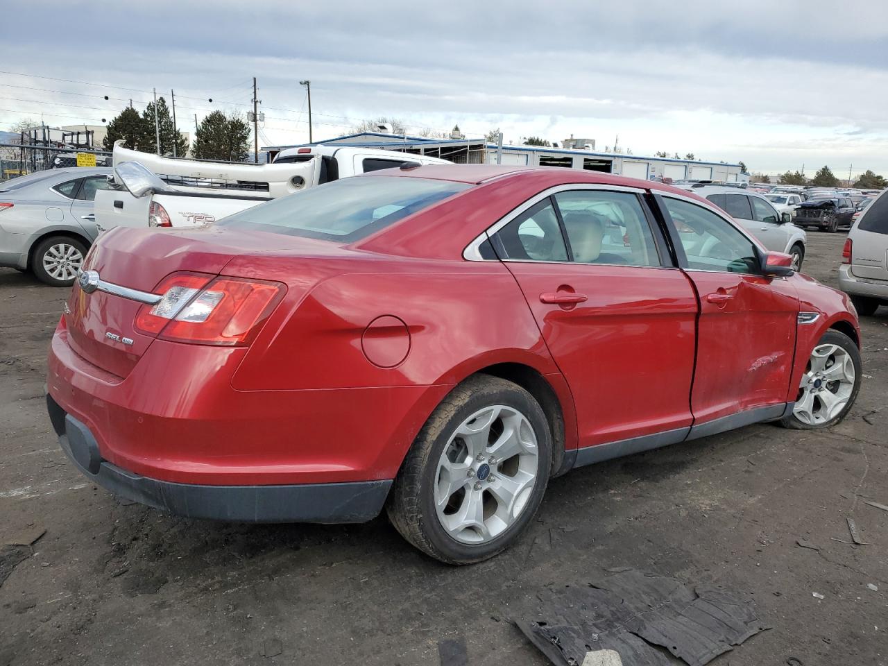 2010 Ford Taurus VIN 1FAHP2HW7AG162810 Copart auction photo, side / front end damage thumbnail 3