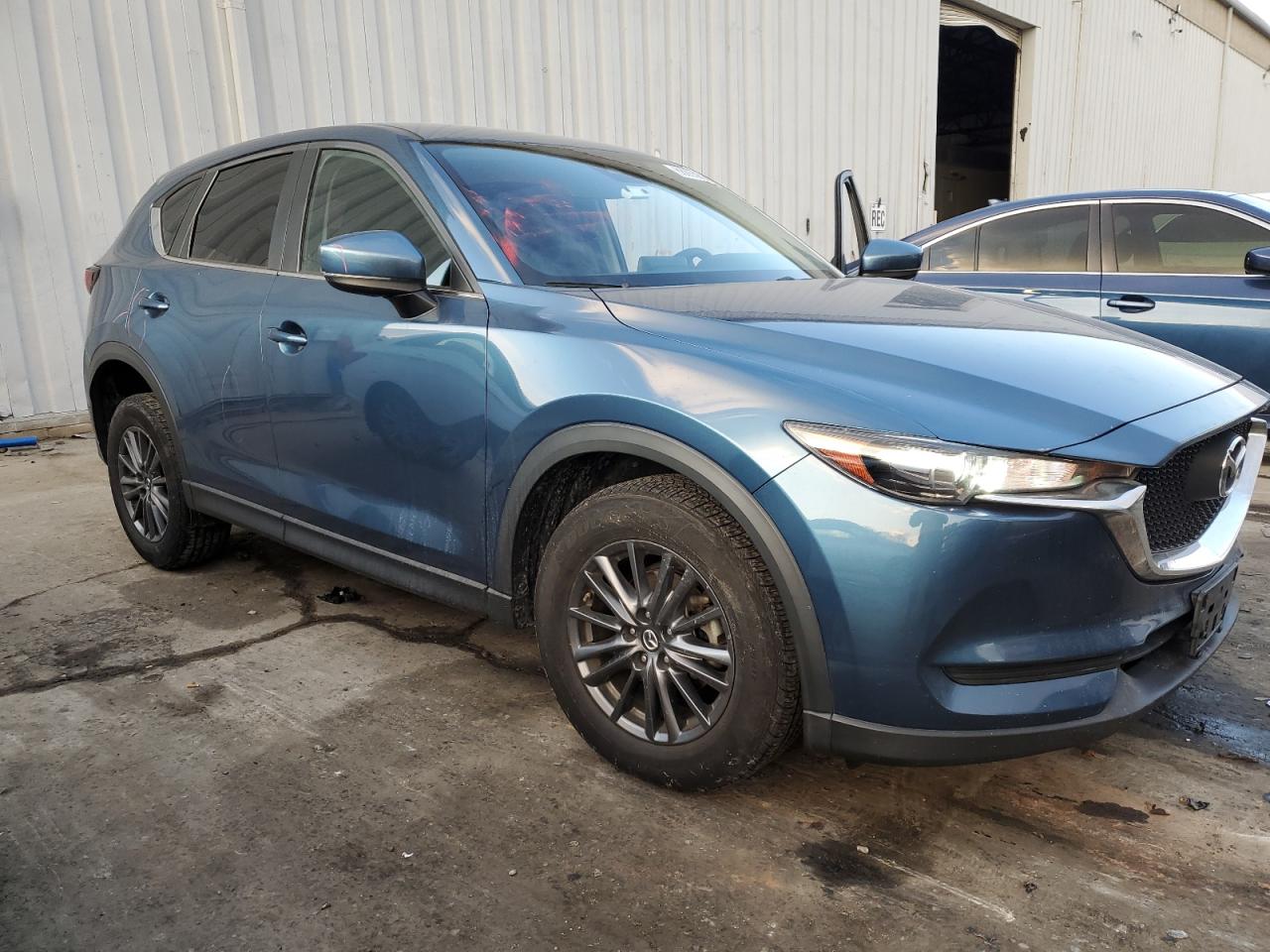 2019 Mazda CX-5 VIN JM3KFBBM7K0694215 Copart auction photo, side / minor dent/scratches damage thumbnail 4