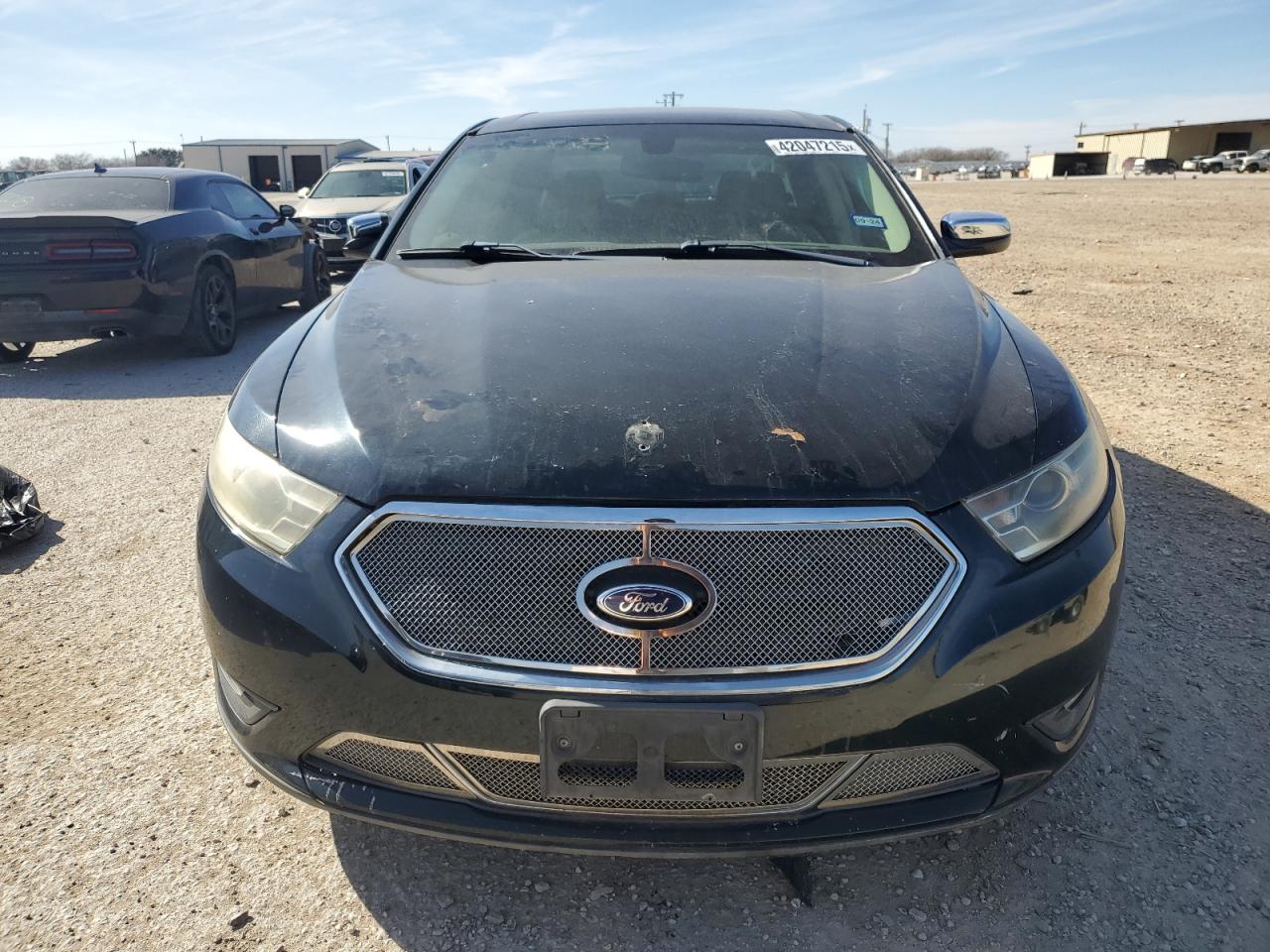 2014 Ford Taurus VIN 1FAHP2F85EG158345 Copart auction photo, vandalism damage thumbnail 5