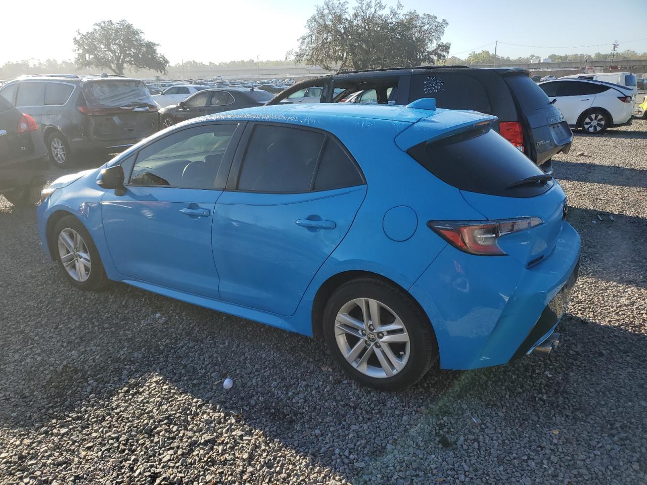 2019 Toyota Corolla VIN JTNK4RBE2K3052575 Copart auction photo, side / rear end damage thumbnail 2
