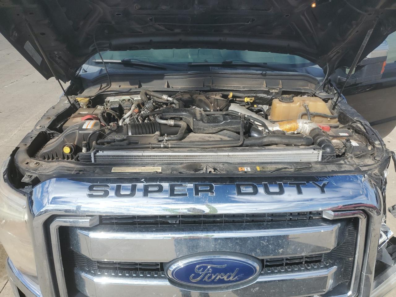 2013 Ford F250 VIN 1FT7W2BT0DEB23113 Copart auction photo, side / front end damage thumbnail 13