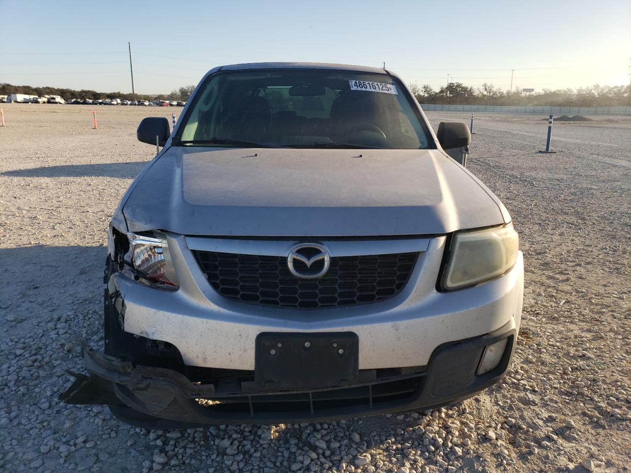 2011 Mazda Tribute VIN 4F2CY0C73BKM05324 Copart auction photo, front end damage thumbnail 5