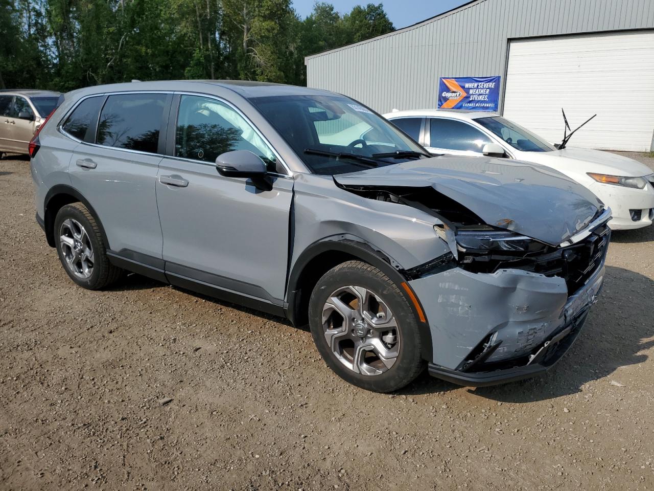2023 Honda CR-V VIN 2HKRS4H79PH117275 Copart auction photo, front end damage thumbnail 4