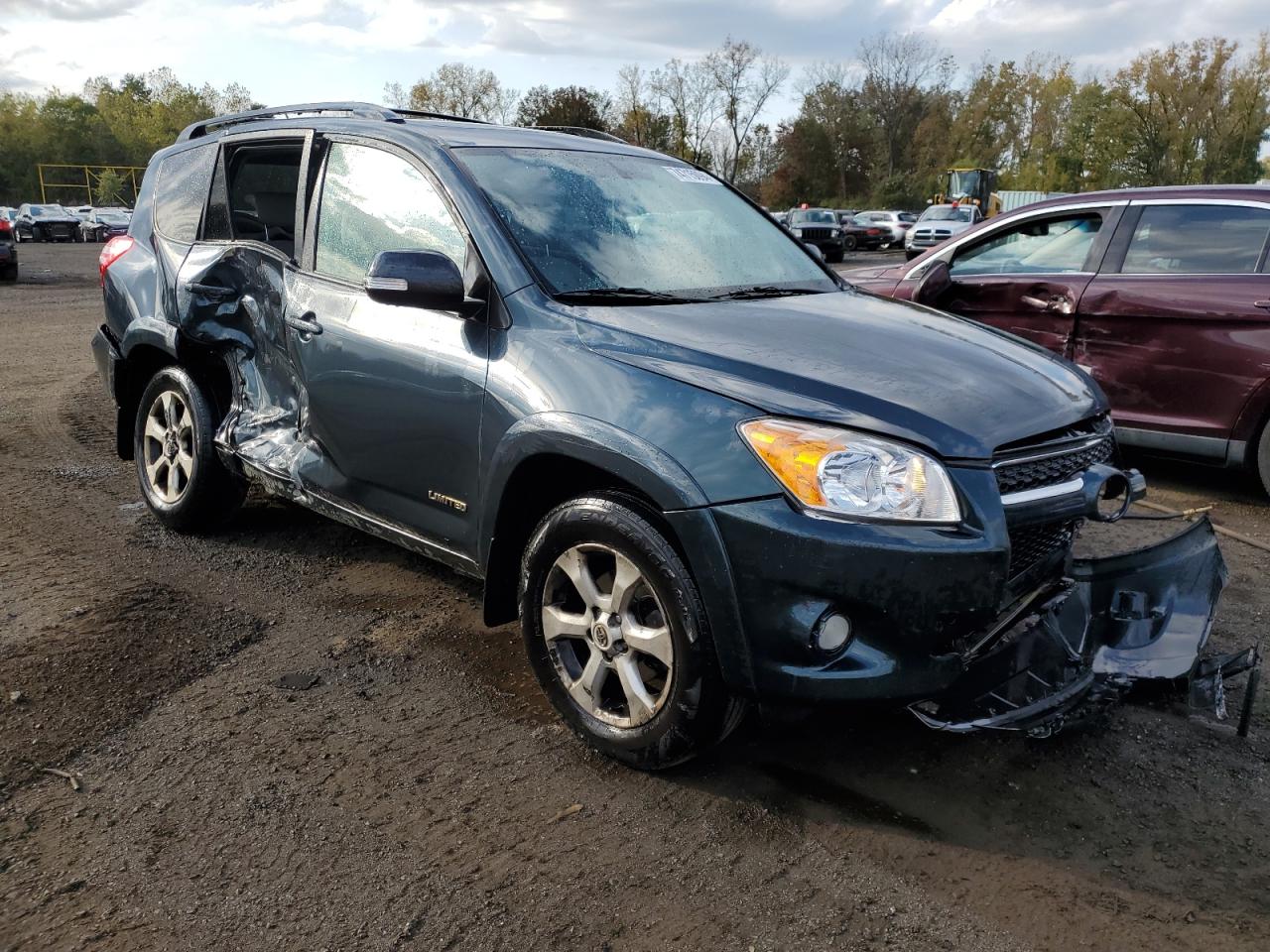 2011 Toyota RAV 4 VIN 2T3DK4DV4BW044543 Copart auction photo, side / front end damage thumbnail 4