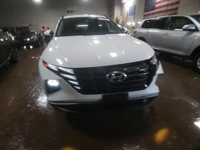 2023 Hyundai Tucson VIN 5NMJFCAE7PH291718 Copart auction photo, front end / side damage thumbnail 13