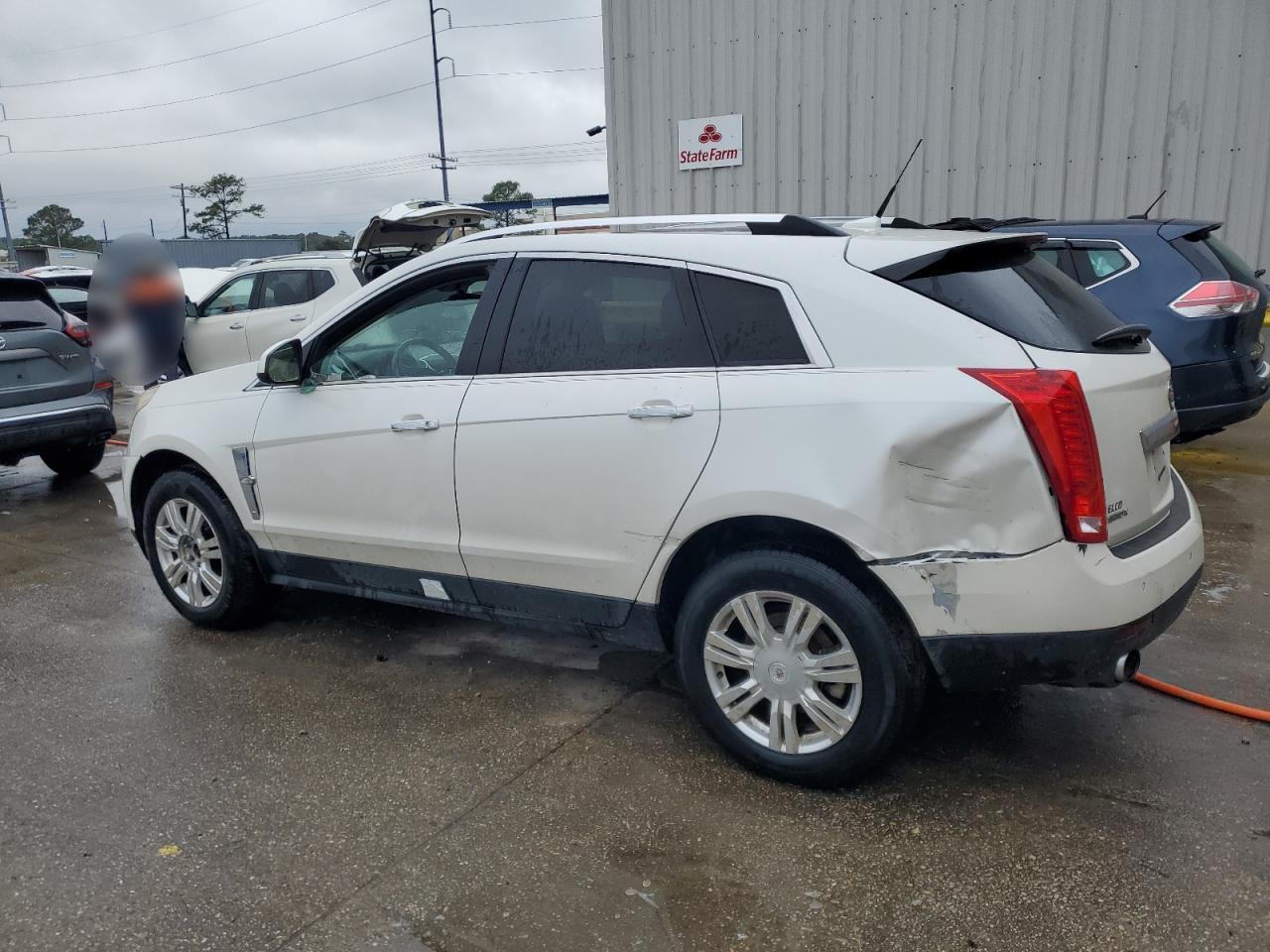 2010 Cadillac SRX VIN 3GYFNBEY1AS620074 Copart auction photo, water/flood / all over damage thumbnail 2