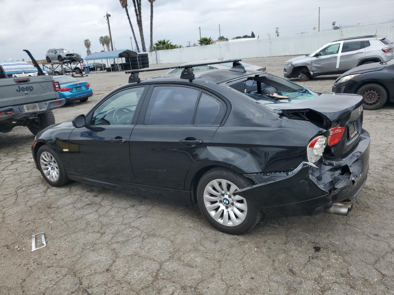 2009 BMW 3er VIN WBAPH53589A438779 Copart auction photo, rear end / minor dent/scratches damage thumbnail 2