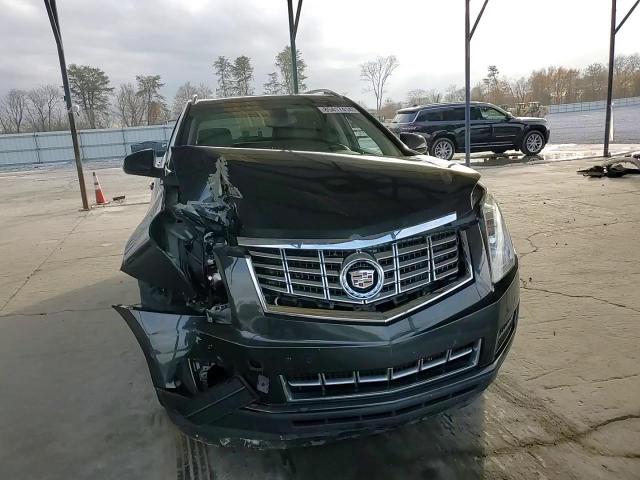 2015 Cadillac SRX VIN 3GYFNBE31FS615968 Copart auction photo, all over damage thumbnail 11