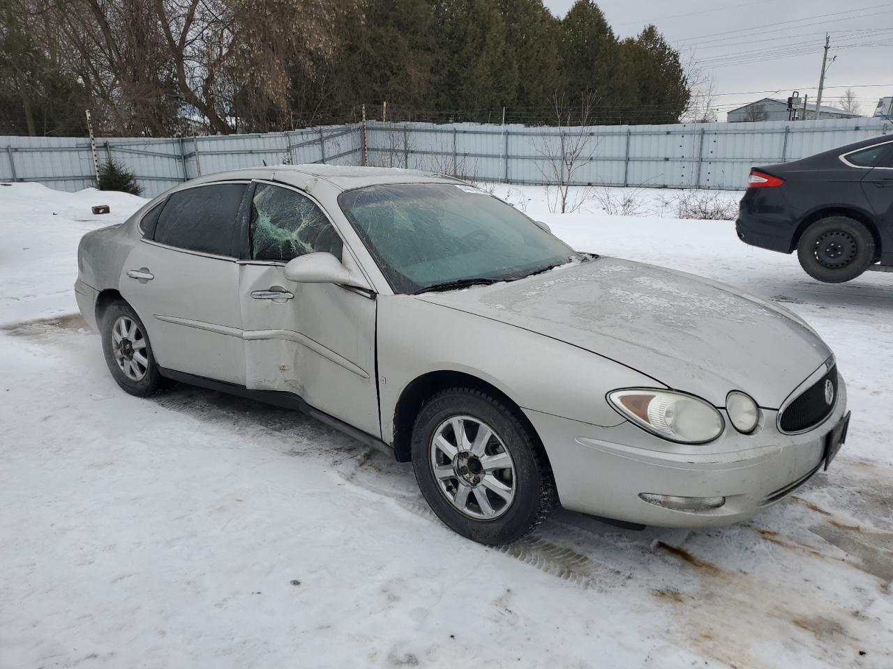 2006 Buick Allure VIN 2G4WF582461216907 Copart auction photo, side / top/roof damage thumbnail 4