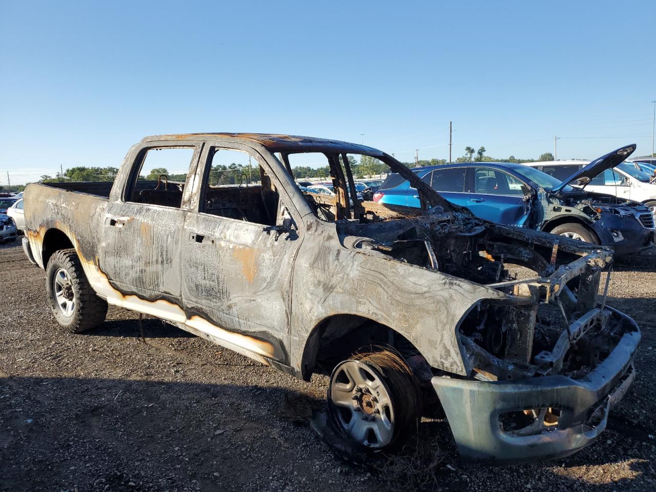 2020 RAM 2500 VIN 3C6UR5CJ5LG259034 Copart auction photo, burn damage thumbnail 4