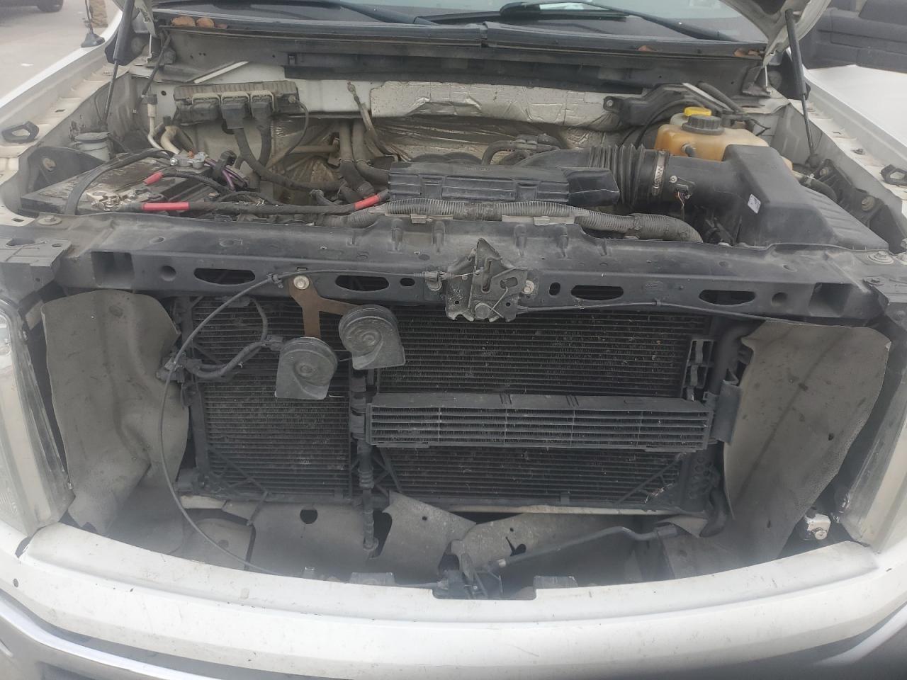 2014 Ford F-150 VIN 1FTFW1EF2EKE11259 Copart auction photo, side damage thumbnail 11