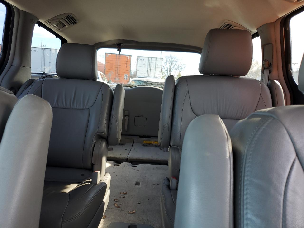 2010 Toyota Sienna VIN 5TDYK4CC1AS310702 Copart auction photo, side / front end damage thumbnail 10
