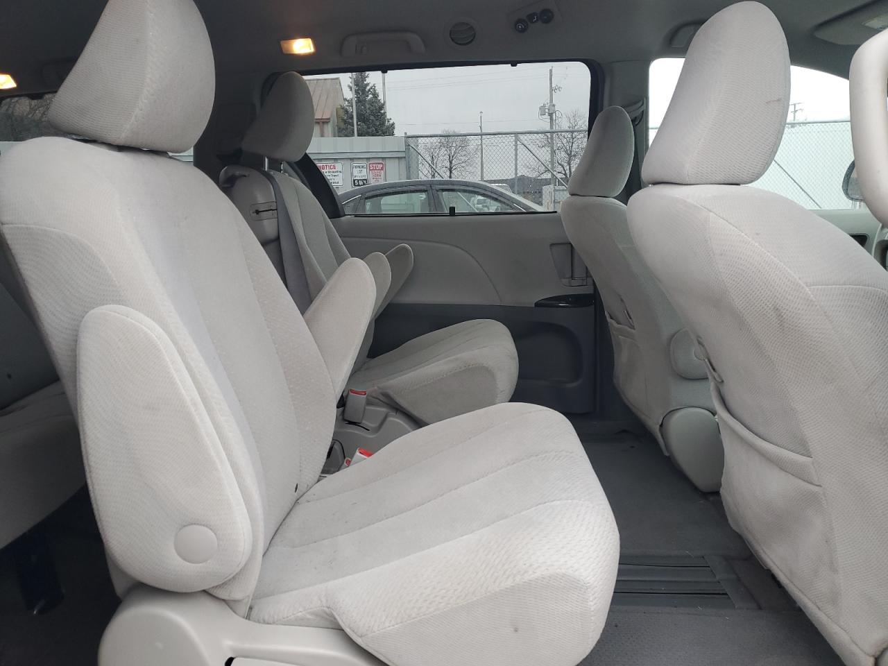 2011 Toyota Sienna VIN 5TDKK3DC8BS091057 Copart auction photo, front end / side damage thumbnail 12