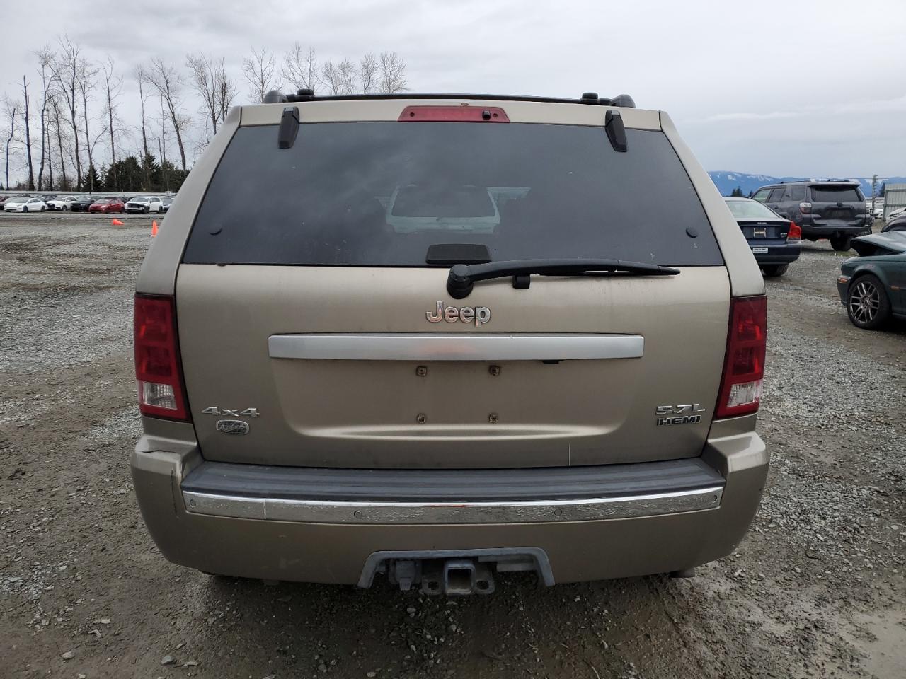 2006 Jeep Grand Cherokee VIN 1J8HR68206C130250 Copart auction photo, side / rear end damage thumbnail 6