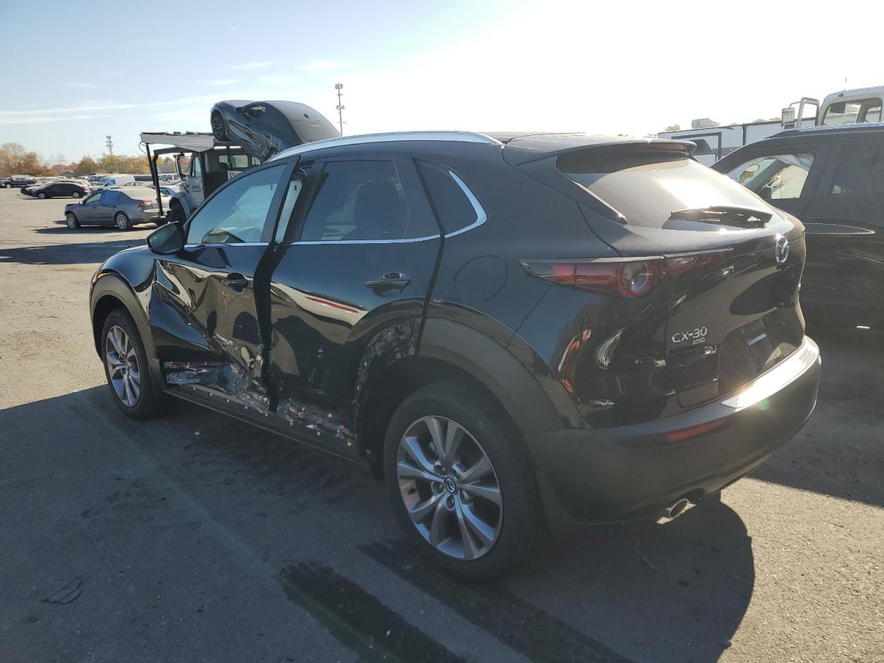 2023 Mazda CX-30 VIN 3MVDMBCM1PM554671 Copart auction photo, side damage thumbnail 2