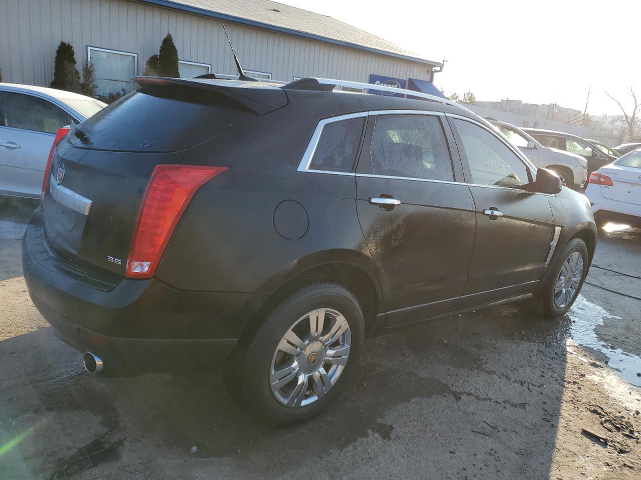 2012 Cadillac SRX VIN 3GYFNDE30CS578435 Copart auction photo, rear end damage thumbnail 3