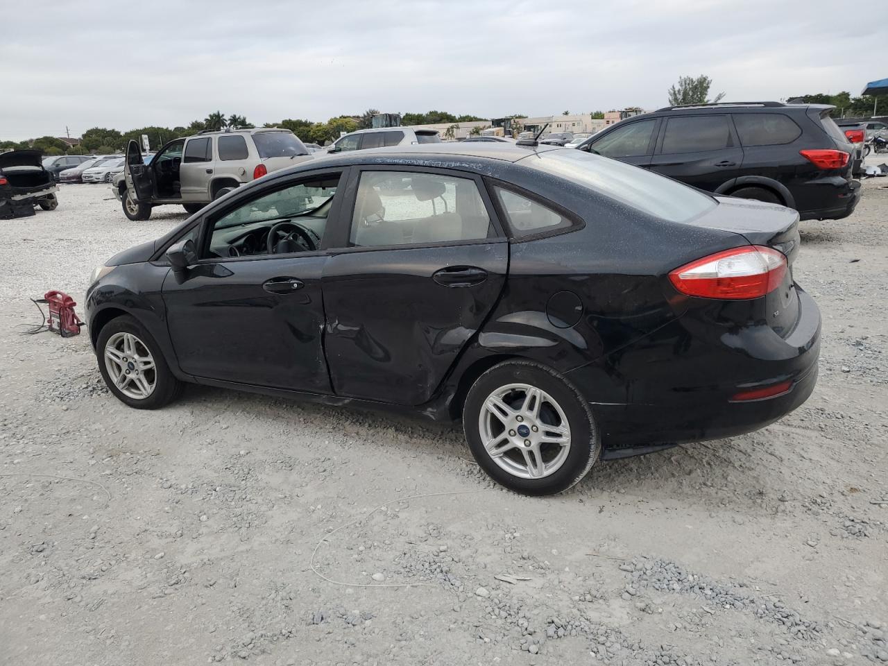 2019 Ford Fiesta VIN 3FADP4BJ1KM141966 Copart auction photo, side / rear end damage thumbnail 2