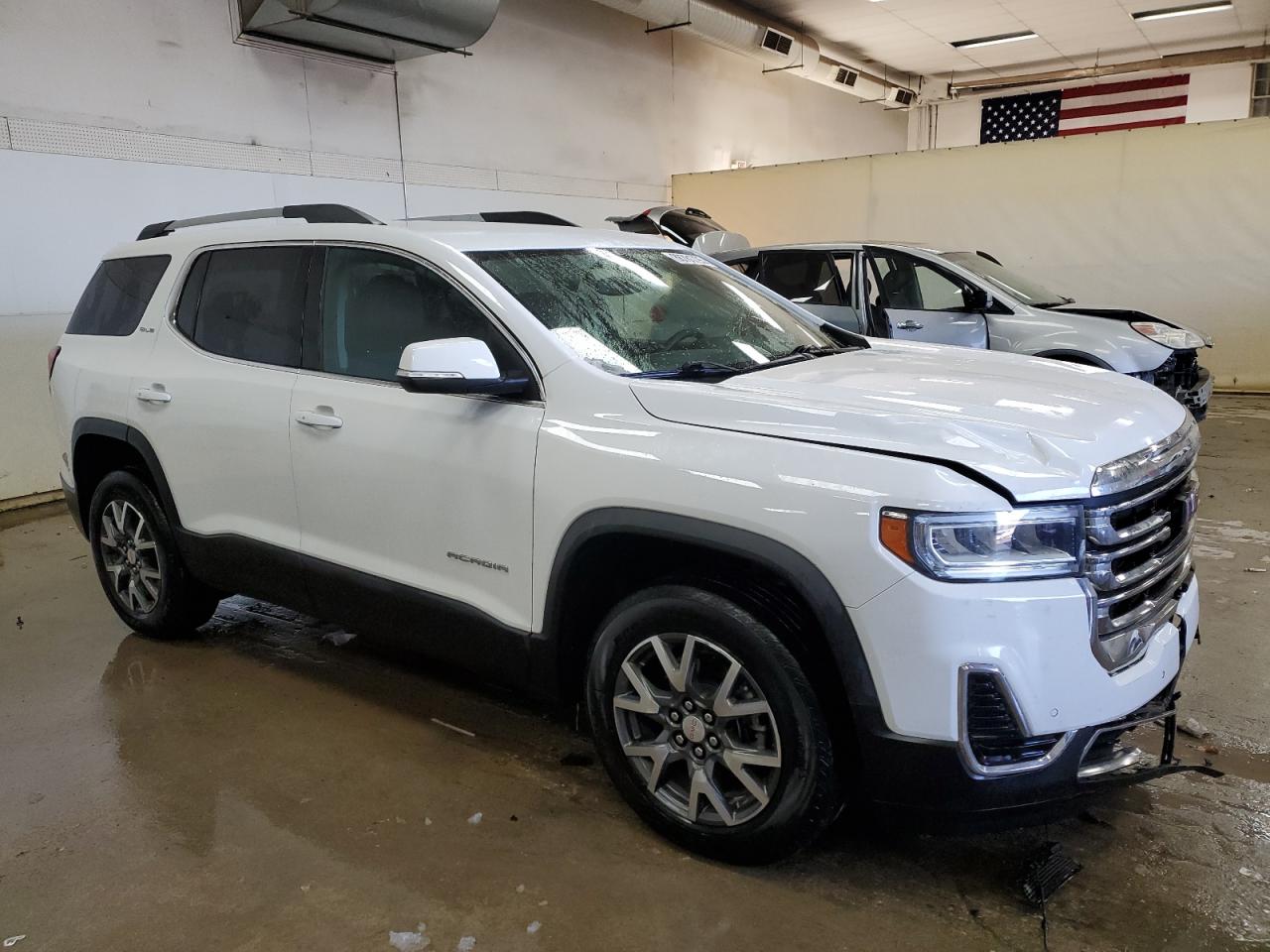 2021 GMC Acadia VIN 1GKKNRL43MZ160876 Copart auction photo, front end / minor dent/scratches damage thumbnail 4