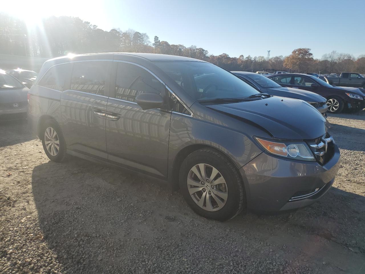 2014 Honda Odyssey VIN 5FNRL5H47EB131759 Copart auction photo, front end / minor dent/scratches damage thumbnail 4