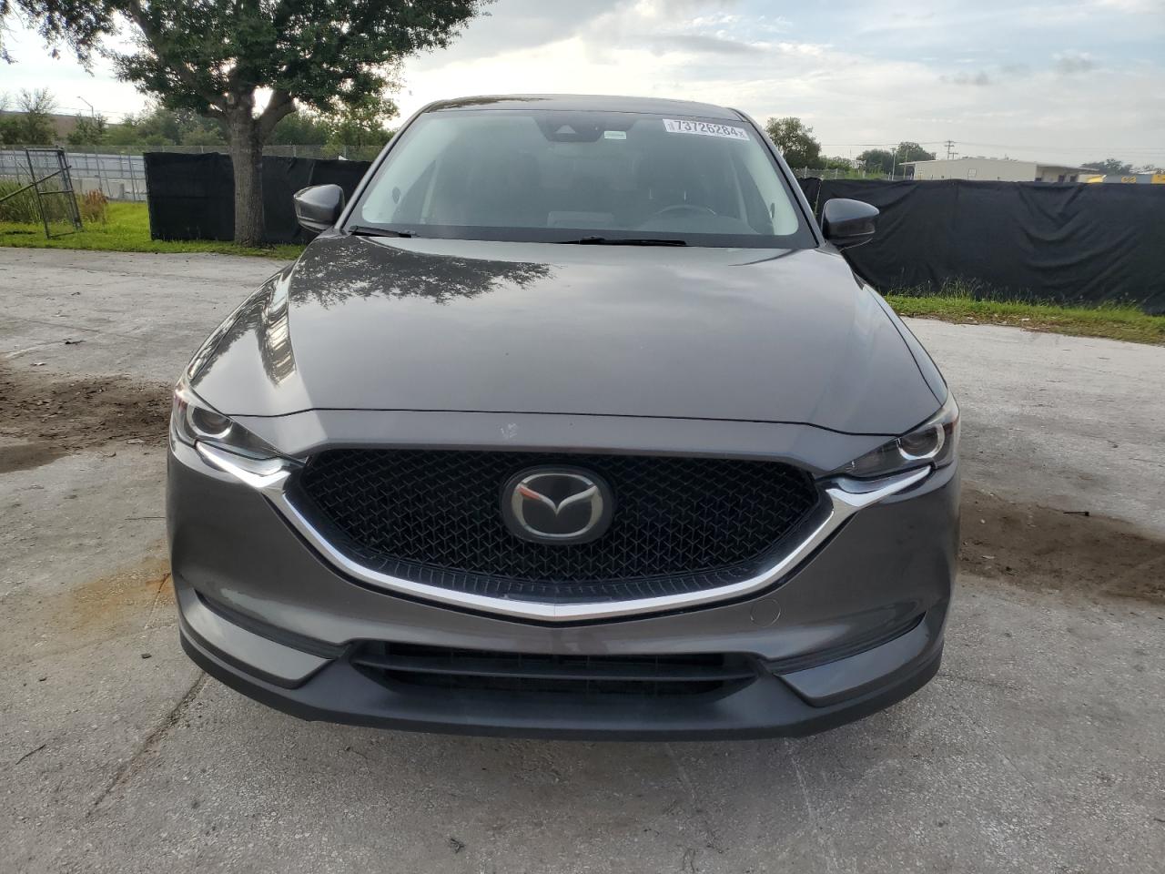2018 Mazda CX-5 VIN JM3KFACM4J1430659 Copart auction photo, side damage thumbnail 5