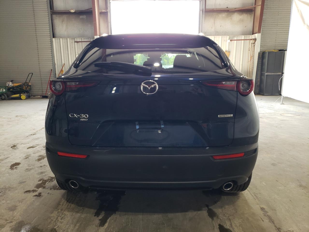 2024 Mazda CX-30 VIN 3MVDMBBM1RM651423 Copart auction photo, side / front end damage thumbnail 6