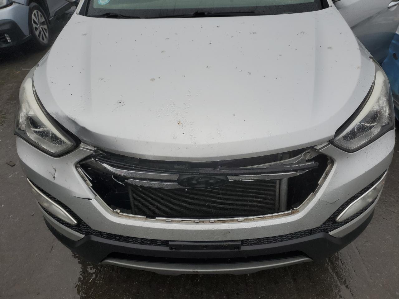 2014 Hyundai Santa Fe VIN 5XYZU3LB8EG170554 Copart auction photo, front end damage thumbnail 11