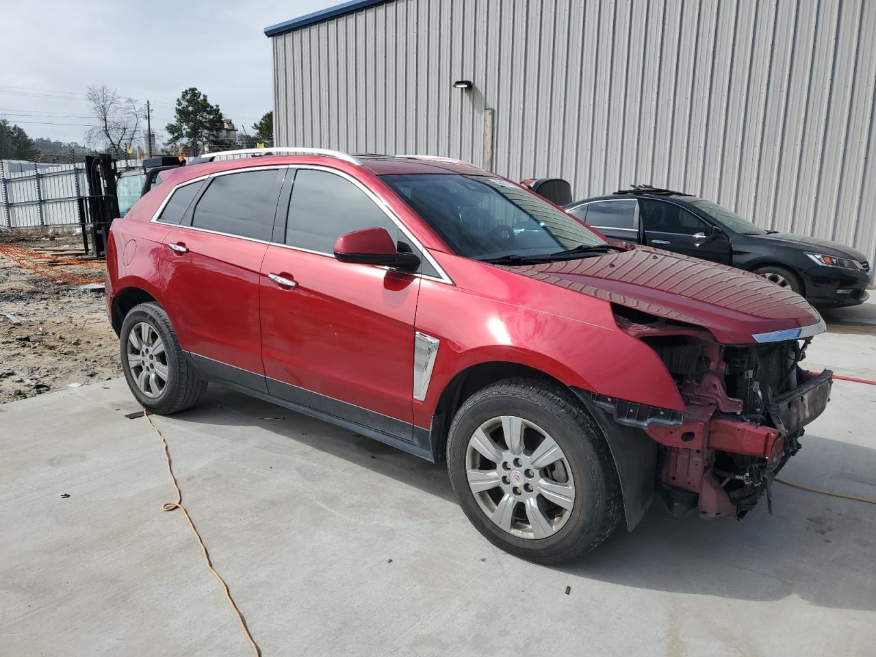 2015 Cadillac SRX VIN 3GYFNBE37FS640339 Copart auction photo, front end damage thumbnail 4
