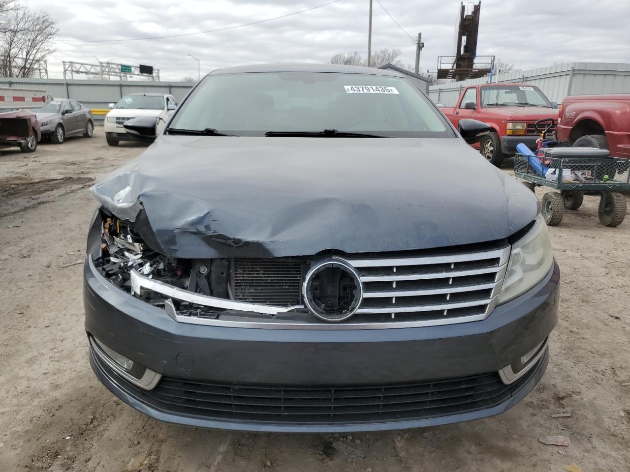 2013 Volkswagen Passat CC VIN WVWBP7AN6DE501989 Copart auction photo, undercarriage / front end damage thumbnail 5