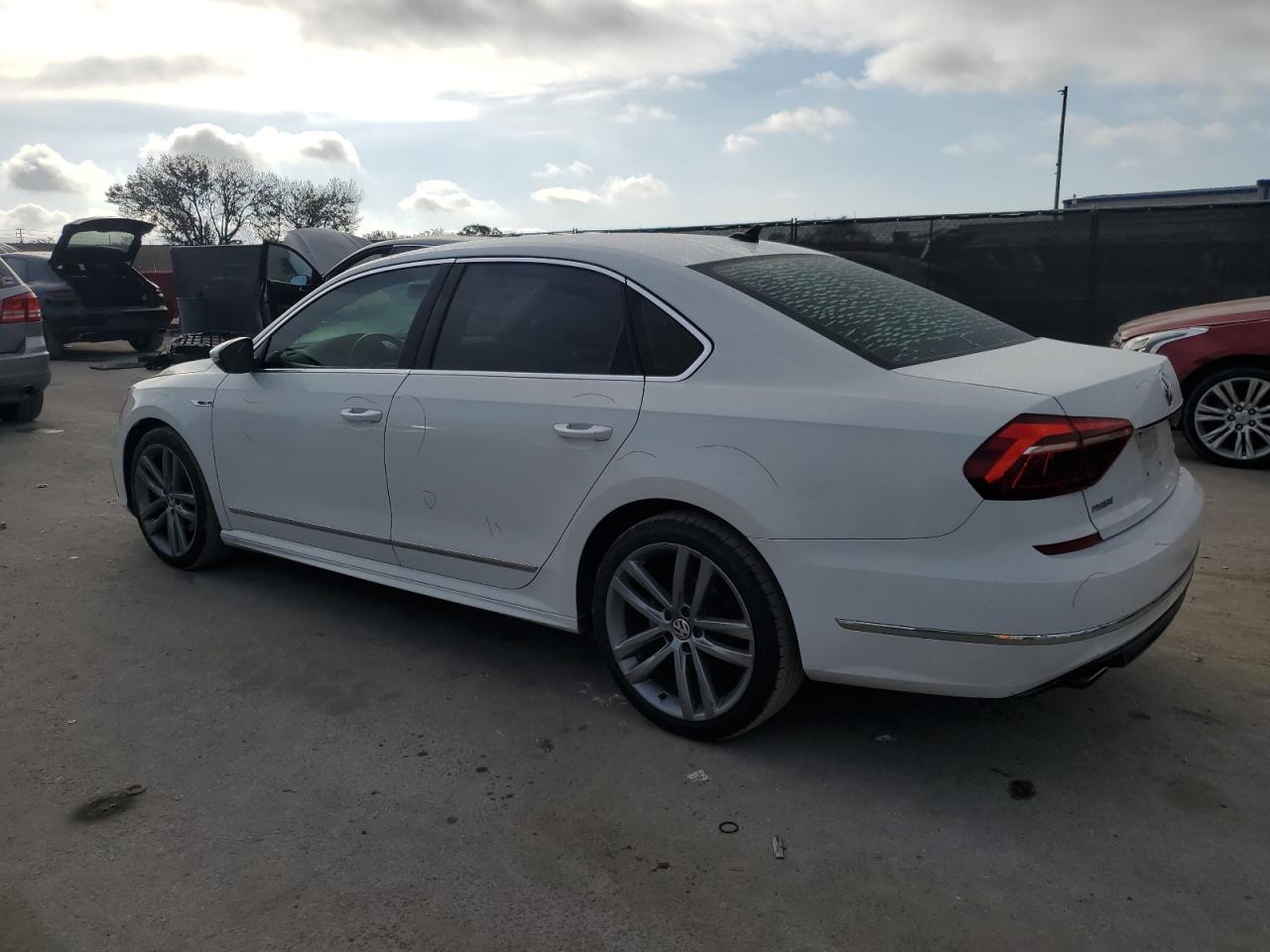 2017 Volkswagen Passat VIN 1VWDT7A38HC038223 Copart auction photo, side / minor dent/scratches damage thumbnail 2