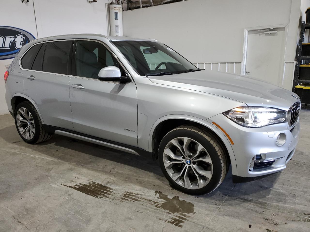 2017 BMW X5 VIN 5UXKR0C38H0V77910 Copart auction photo, minor dent/scratches damage thumbnail 4