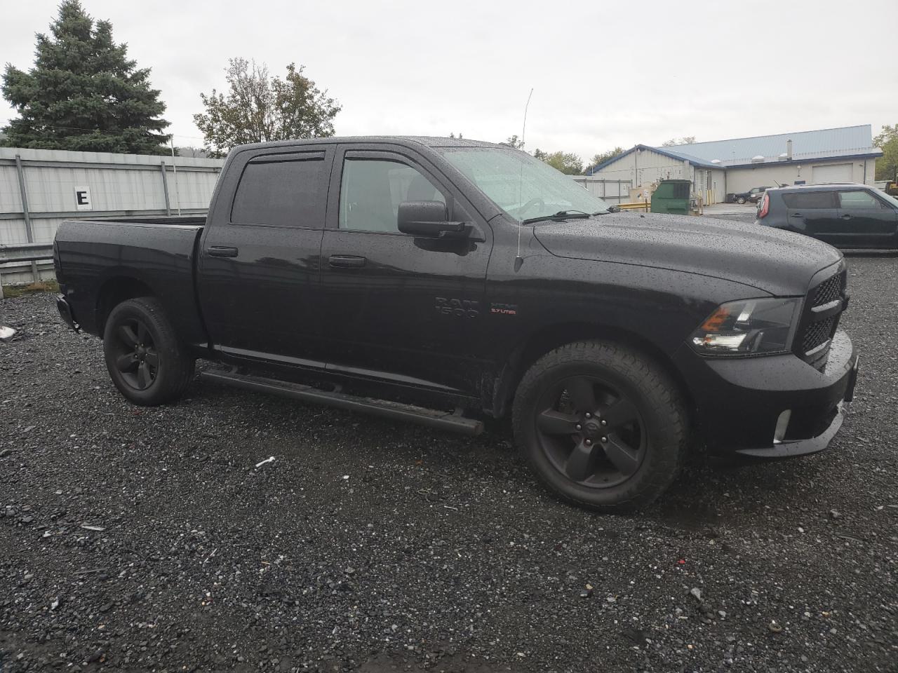 2018 RAM 1500 VIN 3C6RR7KT1JG130922 Copart auction photo, rear end damage thumbnail 4