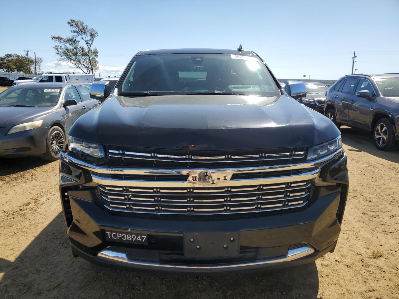 2021 Chevrolet Suburban VIN 1GNSCFKD4MR280839 Copart auction photo, front end / side damage thumbnail 5