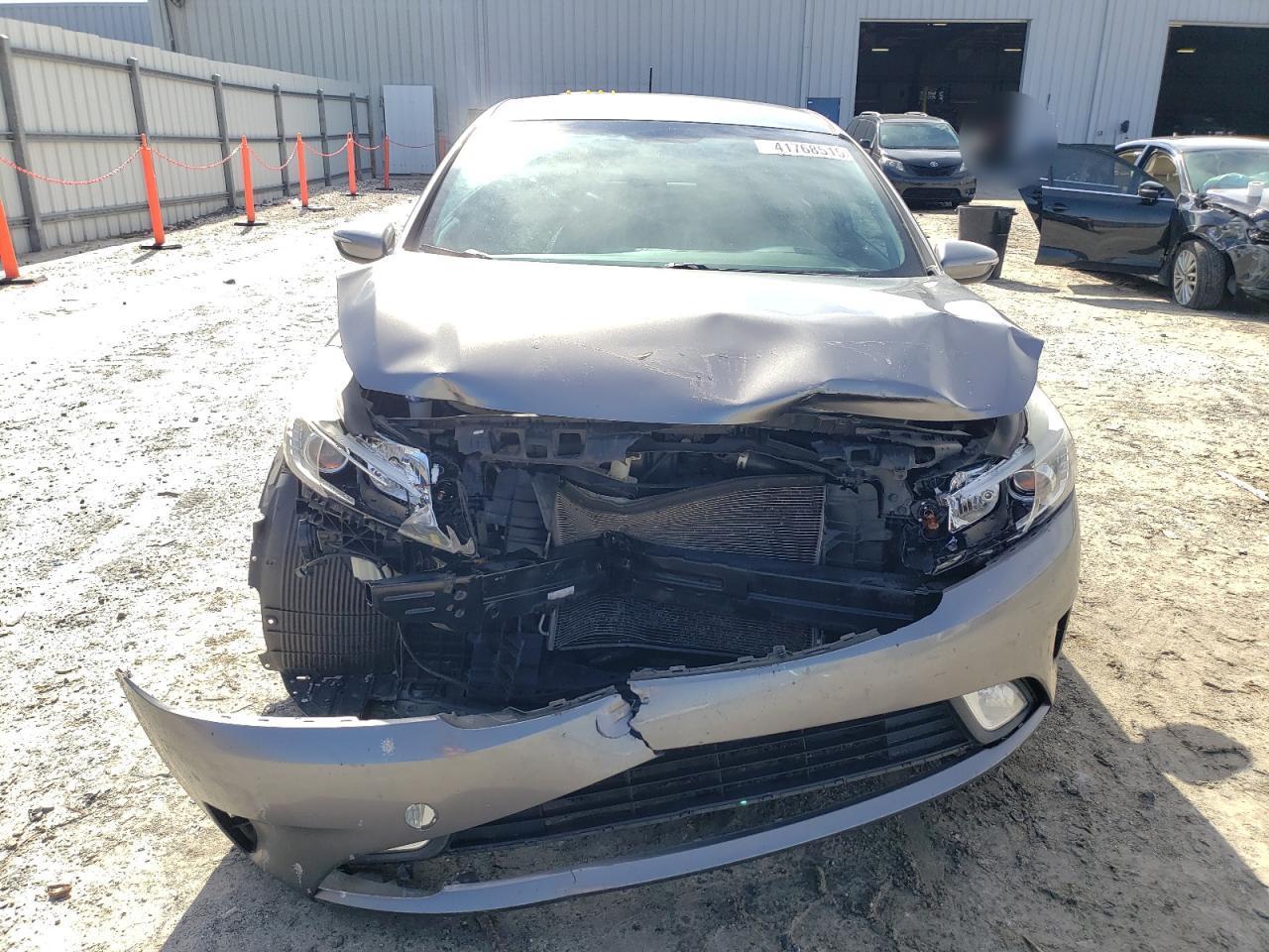 2017 KIA Forte VIN KNAFX5A87H5701511 Copart auction photo, front end / minor dent/scratches damage thumbnail 5