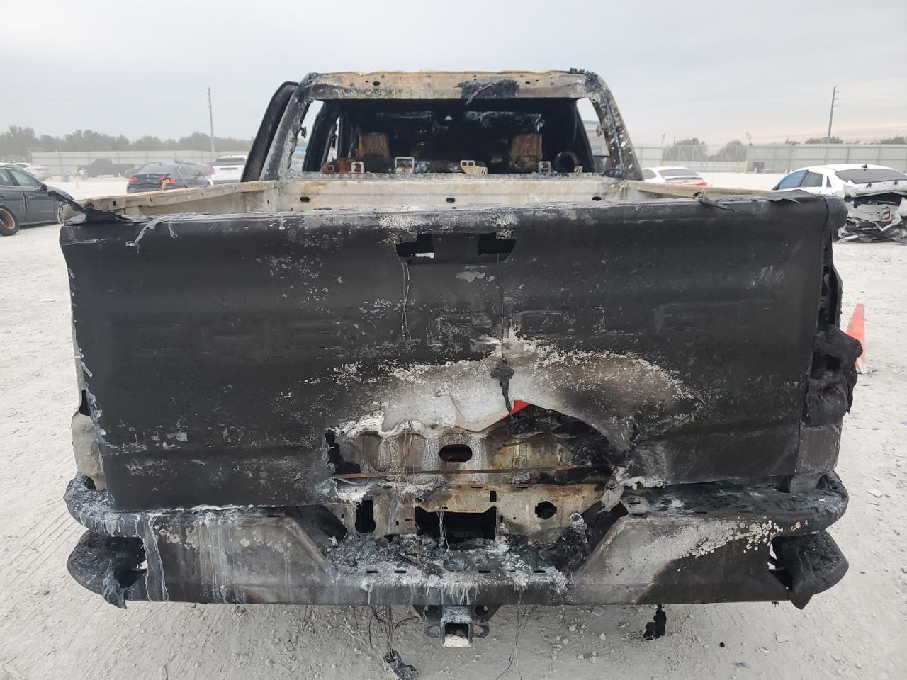 2023 Chevrolet Silverado VIN 3GCPABEK0PG128004 Copart auction photo, burn damage thumbnail 6
