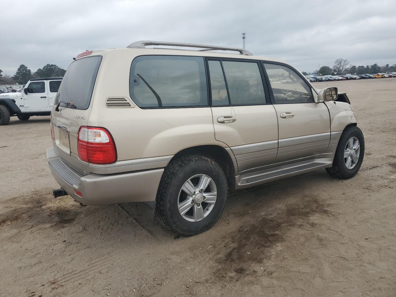 2000 Lexus LX VIN JT6HT00W5Y0103237 Copart auction photo, front end / side damage thumbnail 3
