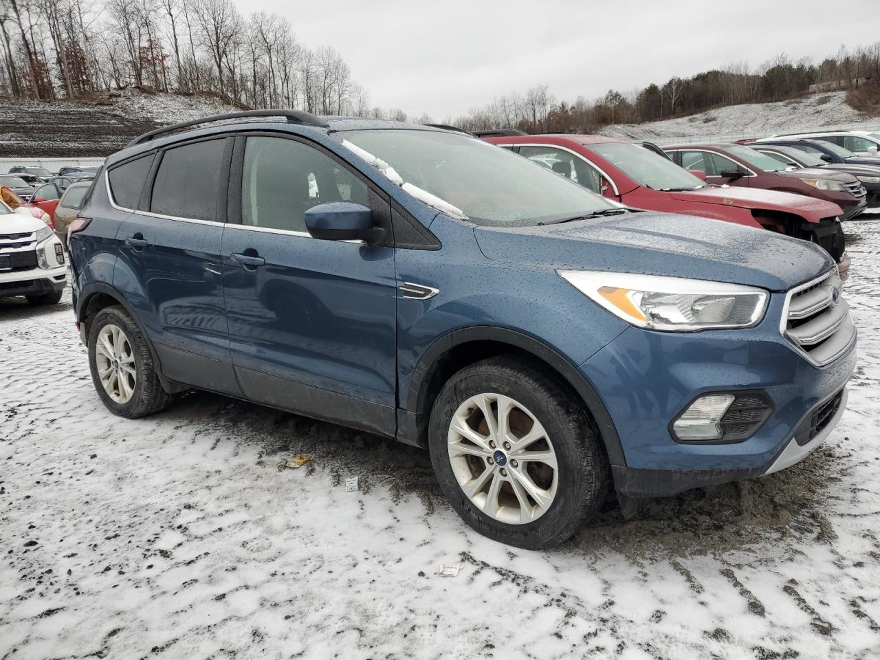 2018 Ford Escape VIN 1FMCU9GD9JUC72843 Copart auction photo, side / rear end damage thumbnail 4