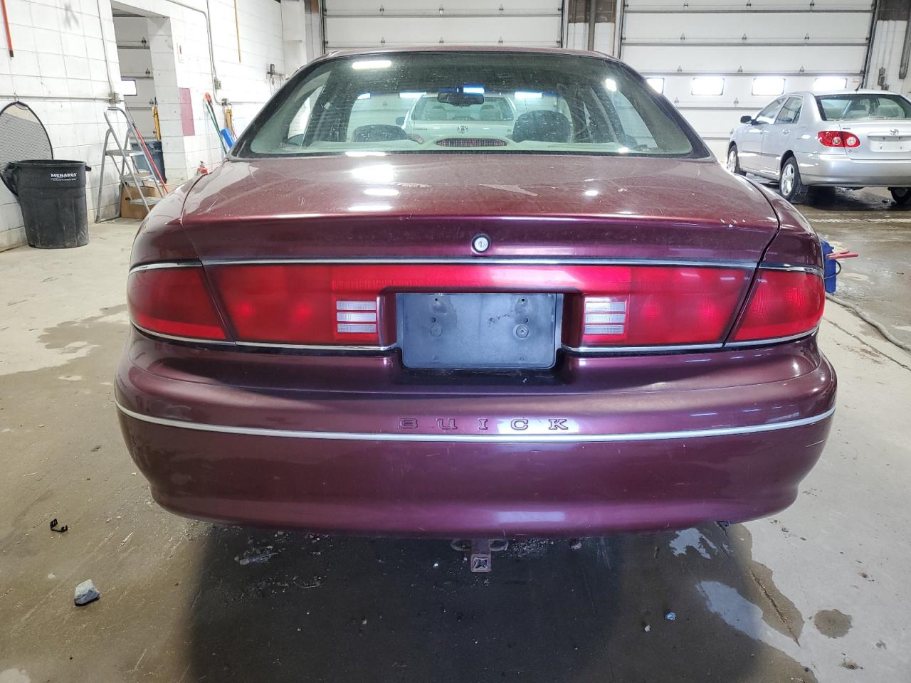 1999 Buick Century VIN 2G4WS52M5X1496568 Copart auction photo, all over damage thumbnail 6