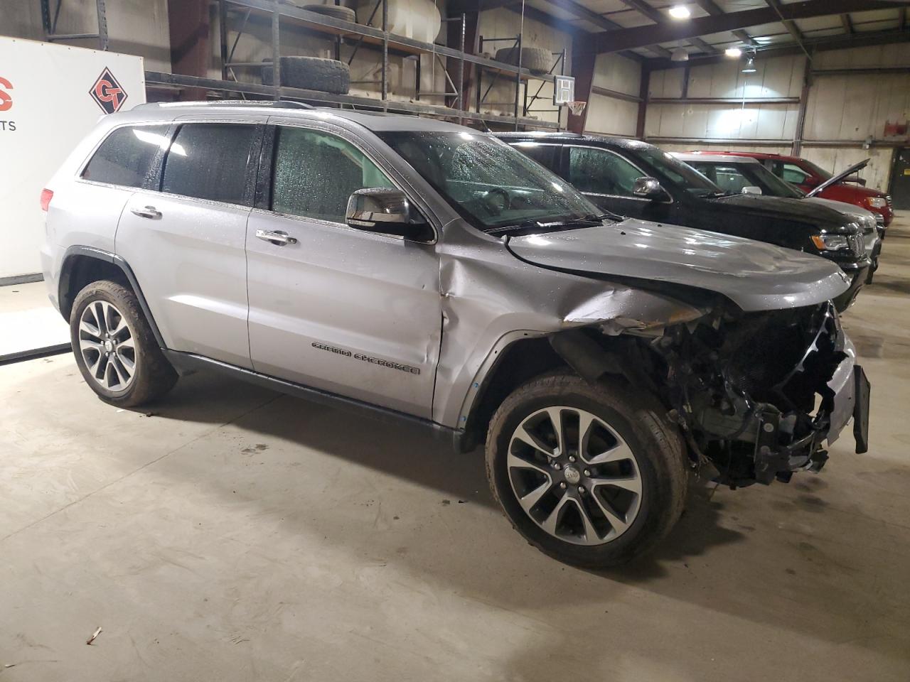 2018 Jeep Grand Cherokee VIN 1C4RJFBG0JC222359 Copart auction photo, front end / rear end damage thumbnail 4