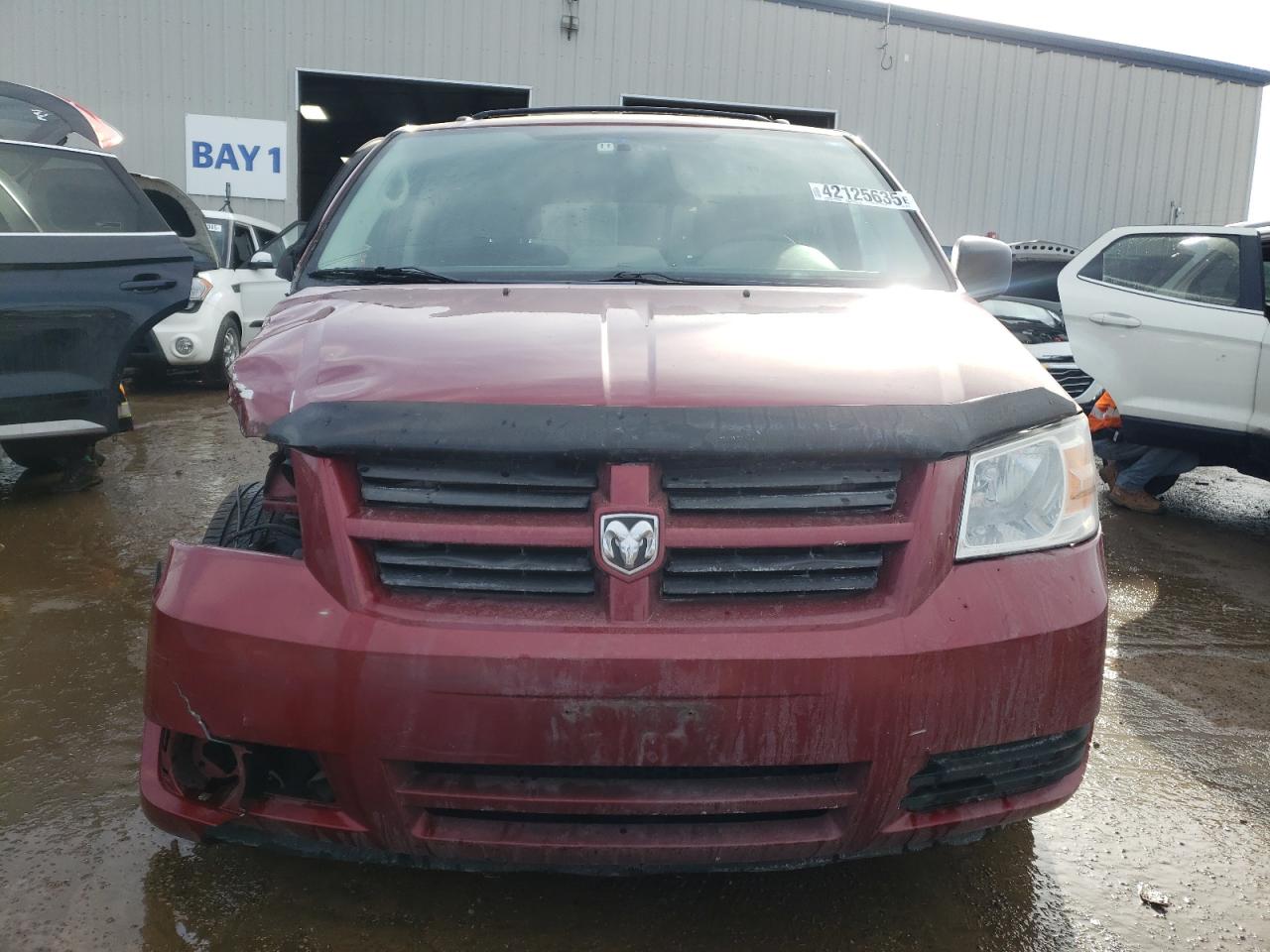2010 Dodge Caravan VIN 2D4RN3D19AR450219 Copart auction photo, front end / side damage thumbnail 5