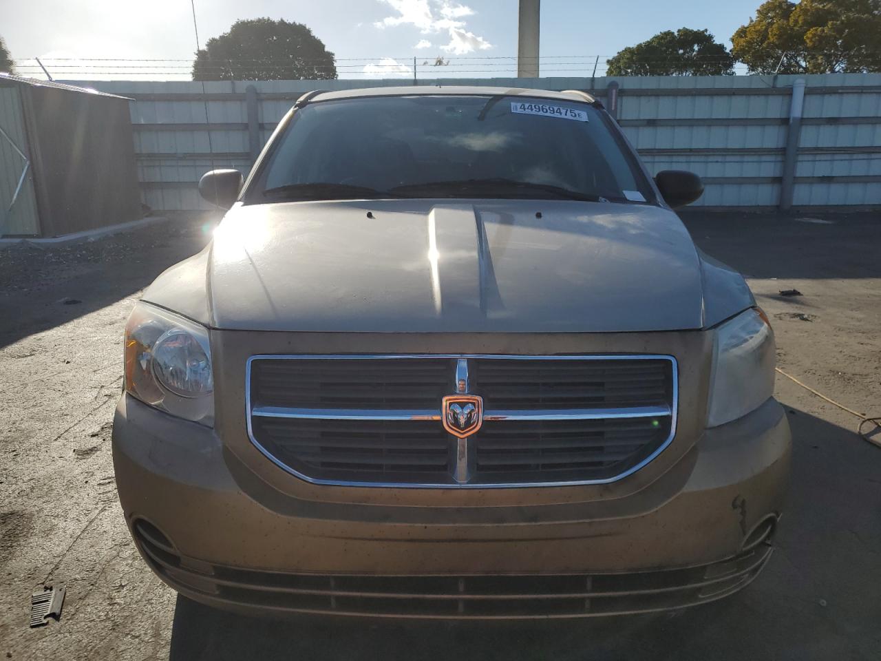 2009 Dodge Caliber VIN 1B3HB48A69D170775 Copart auction photo, front end / side damage thumbnail 5