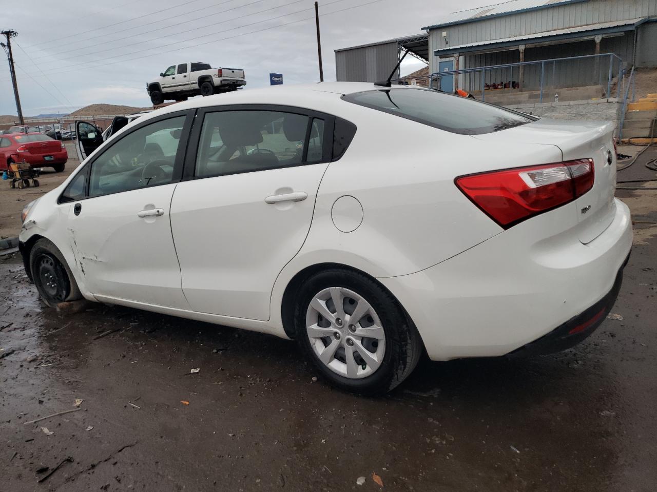 2014 KIA Rio VIN KNADM4A39E6332834 Copart auction photo, side / front end damage thumbnail 2